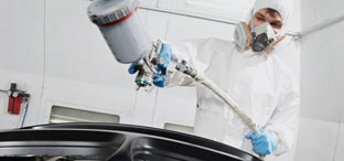 Man detailing a vehicle