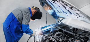 Man working on a vehicle